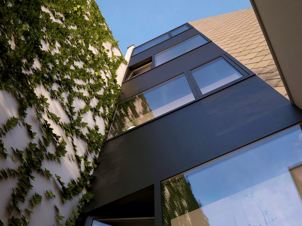 Onze-Lieve-Vrouwestraat, Mechelen — zwarte glasgevel